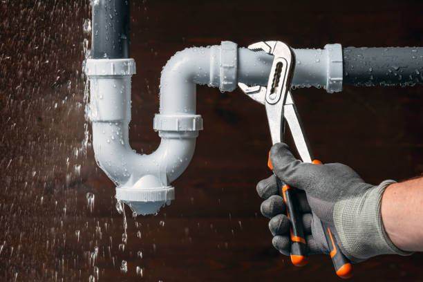 Professional Emergency Plumber technician working in Menomonee Falls, WI